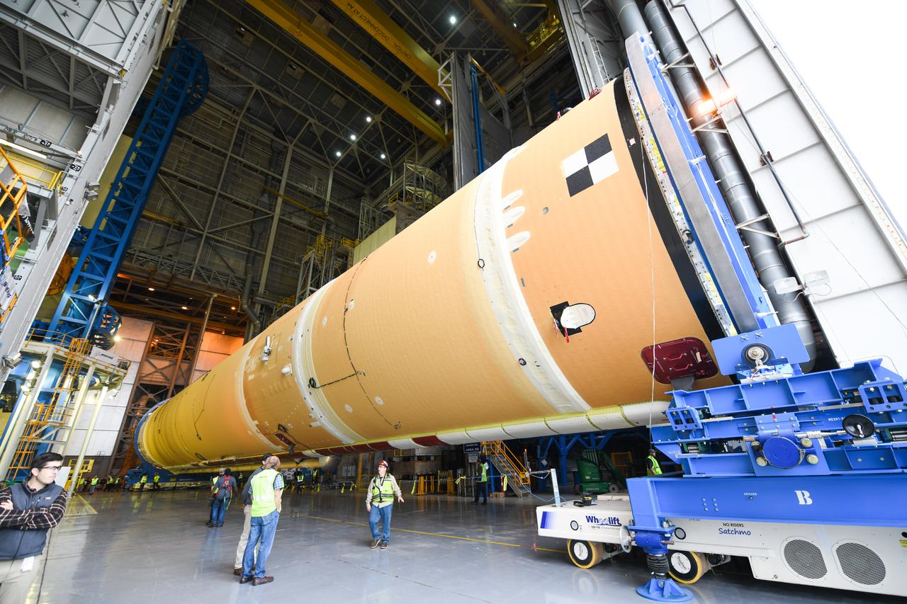 These images show how teams at NASA’s Michoud Assembly Facility in New Orleans moved the core stage, complete with all four RS-25 engines, for NASA’s Space Launch System (SLS) rocket to Building 110 for final shipping preparations on Jan. 1. The SLS core stage includes state-of-the-art avionics, propulsion systems and two colossal propellant tanks that collectively hold 733,000 gallons of liquid oxygen and liquid hydrogen to power its four RS-25 engines. The completed stage, which will provide more than 2 million pounds of thrust to help power the first Artemis mission to the Moon, will be shipped via the agency’s Pegasus barge from Michoud to NASA’s Stennis Space Center near Bay St. Louis, Mississippi, later this month. Once at Stennis, the Artemis rocket stage will be loaded into the B-2 Test Stand for the core stage Green Run test series. The comprehensive test campaign will progressively bring the entire core stage, including its avionics and engines, to life for the first time to verify the stage is fit for flight ahead of the launch of Artemis I.